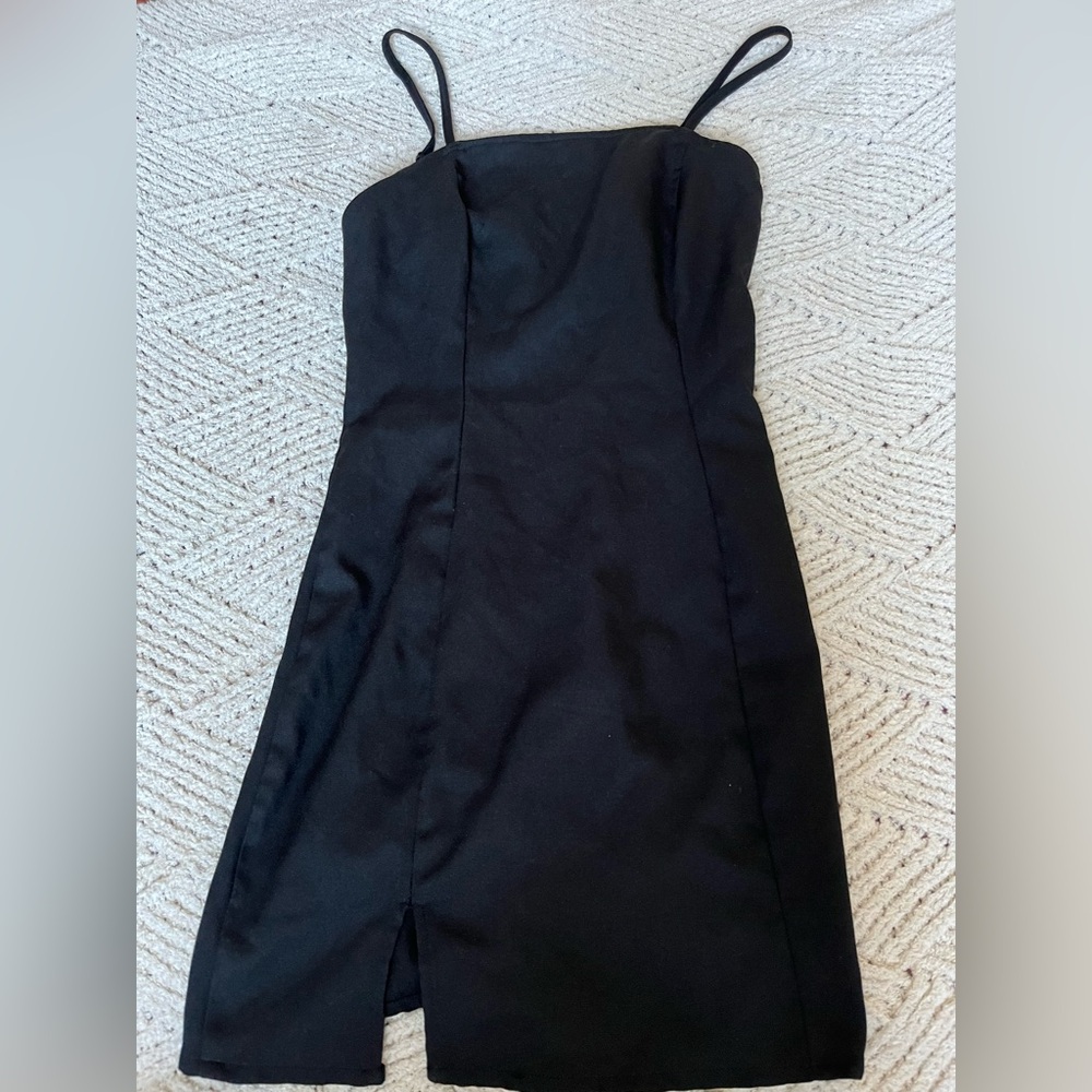 Black silk dress with a cut on the bottom